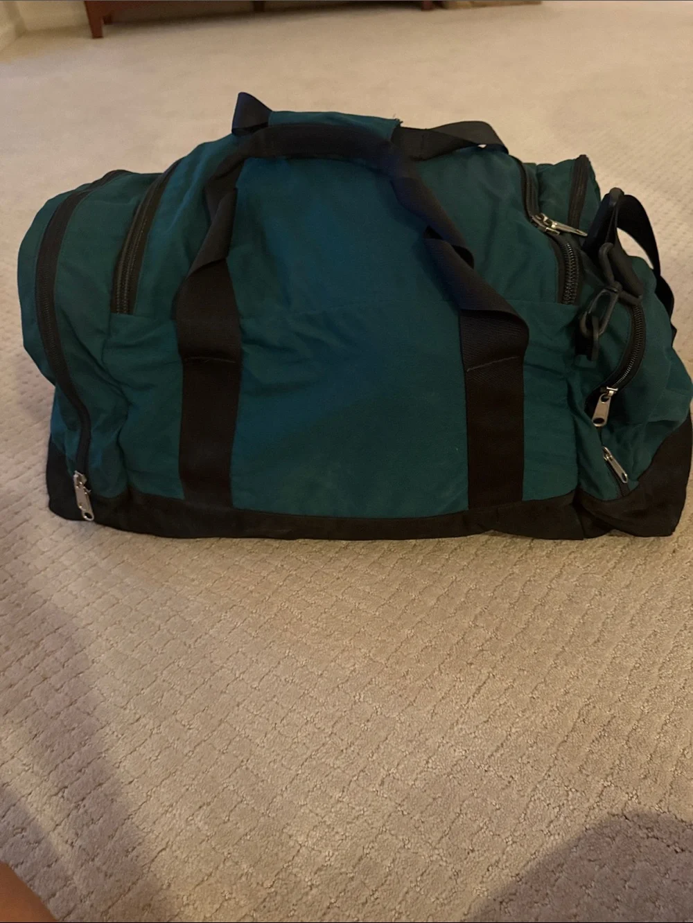 The North Face Green and Black Duffel Bag